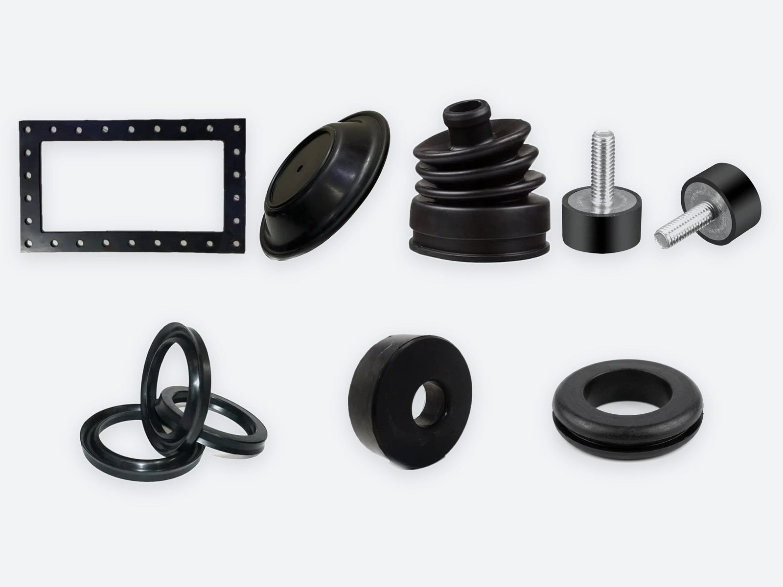 Moulded rubber components: a flange gasket, a diaphragm, a bellows boot, rubber-to-metal stud mounts, lip seals, a rubber bush and a grommet